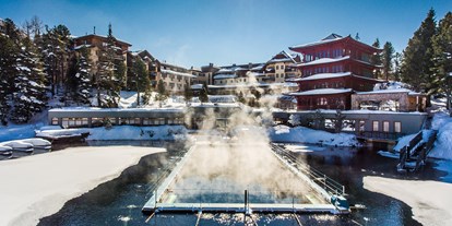 Hotels am See - Liegewiese direkt am See - Kärnten - See-Bad im Winter, Chinaturm - Hotel Hochschober