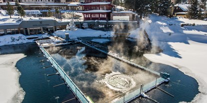 Hotels am See - Liegewiese direkt am See - Kärnten - Schwimmen im 30°C warmen See-Bad im Winter - Hotel Hochschober