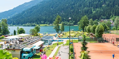 Hotels am See - Liegewiese direkt am See - Kärnten - Seeblick vom Zimmer - Familien - Sportresort BRENNSEEHOF 