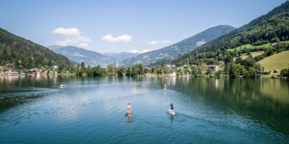 Hotels am See - Liegewiese direkt am See - Kärnten - SUP am Brennsee - Familien - Sportresort BRENNSEEHOF 