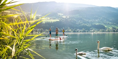 Hotels am See - Liegewiese direkt am See - Kärnten - SUP am Brennsee - Familien - Sportresort BRENNSEEHOF 