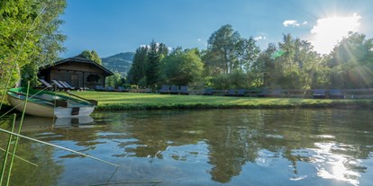 Hotels am See - Liegewiese direkt am See - Kärnten - Das Leonhard - Naturparkhotel am Weissensee - Naturparkhotel Das Leonhard