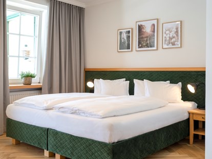 Hotels am See - Liegewiese direkt am See - Österreich - Superior Suite mit Terrasse und Seeblick - Hotel Peter am Wolfgangsee