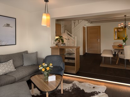 Hotels am See - Klimaanlage - Österreich - Bungalow B2 - Wohn- und Essbereich - VILA VITA Pannonia