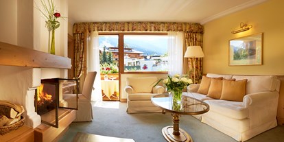 Hotels am See - Bettgrößen: Queen Size Bett - Suite mit Kamin und Sauna - Hotel Salzburgerhof