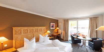 Hotels am See - Bettgrößen: Queen Size Bett - Beispielbild "Hochparterre Premium" Kategorie - Romantik Hotel RESIDENZ AM SEE