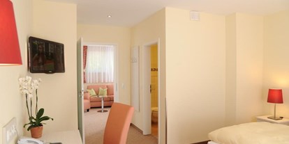 Hotels am See - Hotel unmittelbar am See - Deutschland - Zimmer Seeseite mit Balkon - Strandhaus am Inselsee