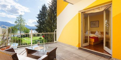 Hotels am See - Liegewiese direkt am See - Kärnten - Doppelzimmer Classic - Erwachsenenhotel "das Moser - Hotel am See"