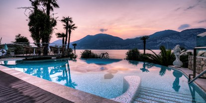 Hotels am See - Restaurant am See - Italien - Infinity-Pool.  - Belfiore Park Hotel