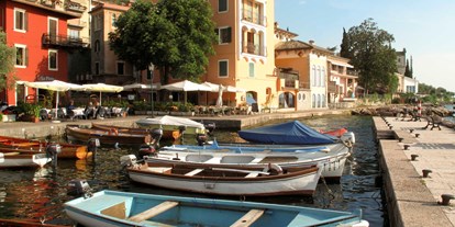 Hotels am See - Umgebungsschwerpunkt: Stadt - Italien - Magugnano. Kleines Dorf mit leckeren Restaurants.  - Hotel Eden Gardasee