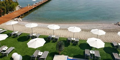 Hotels am See - Liegewiese direkt am See - Gardasee - Verona - Spiaggia attrezzata e pontile esclusivo. - Hotel Ocelle Therme & Spa