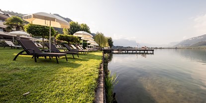 Hotels am See - Liegewiese direkt am See - Trentino-Südtirol - PARC HOTEL AM SEE