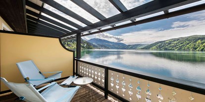 Hotels am See - Liegewiese direkt am See - Feld am See - Ausblick auf den Millstätter See - Seeglück Hotel Forelle**** S Millstatt