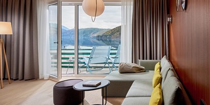 Hotels am See - Umgebungsschwerpunkt: Berg - Seeboden - Wohnbereich der Suite Königsforelle - Seeglück Hotel Forelle**** S Millstatt