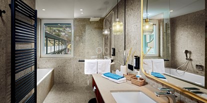 Hotels am See - Zimmer mit Seeblick - Modernes Badezimmer - Seeglück Hotel Forelle**** S Millstatt