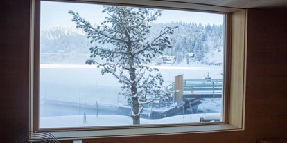 Hotels am See - Zimmer mit Seeblick - Obertschern - Winteraussicht Sauna - Hotel Hochschober