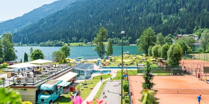 Hotels am See - Pools: Außenpool beheizt - Hundsdorf (Arriach) - Seeblick vom Zimmer - Familien - Sportresort BRENNSEEHOF 