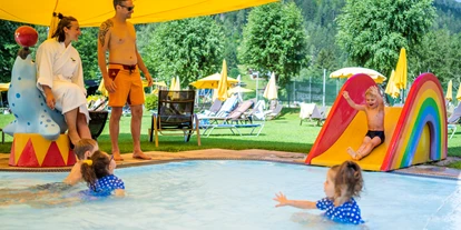 Hotels am See - Garten mit Seezugang - Nußdorf (Spittal an der Drau) - Outdoor Kinderplanschbecken  - Familien - Sportresort BRENNSEEHOF 