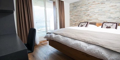 Hotels am See - Bettgrößen: Doppelbett - Greppen - Doppelzimmer mit Seeblich und Balkon - Panoramahotel-Restaurant Roggerli