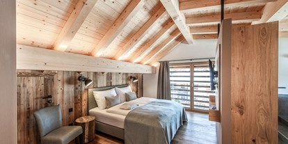 Hotels am See - Bettgrößen: Doppelbett - Masterbedroom im Dachgeschoss mit Seeblick - Im Franzerl am Weissensee