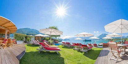 Hotels am See - Balkon - Österreich - Lakeside Badestrand mit Bar und Wasserskischule. - Hotel Furian