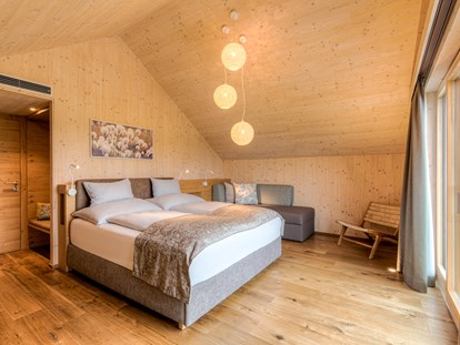 Hotels am See - Liegewiese direkt am See - Schlafzimmer Residenzen am See - lakeside - VILA VITA Pannonia