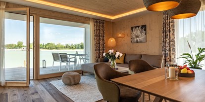 Hotels am See - Ladestation Elektroauto - Podersdorf am See - Wohnküche mit eigenem Steg am See ... Residenzen am See - lakeside - VILA VITA Pannonia
