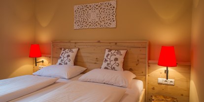 Hotels am See - Art des Seezugangs: hoteleigener Strand - PLZ 7141 (Österreich) - Bungalow A2 - Schlafzimmer  - VILA VITA Pannonia