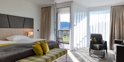 Hotels am See - Umgebungsschwerpunkt: Stadt - Besendorf (Glanegg) - Deluxe Zimmer - Hotel Plattenwirt