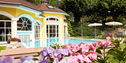 Hotels am See - Pools: Außenpool beheizt - Österreich - Wellnessbereich / Außenpool - RomantikHotel Zell Am See