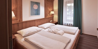 Hotels am See - Art des Seezugangs: Strandbad - Traumsuite - Familienappartement - RomantikHotel Zell Am See