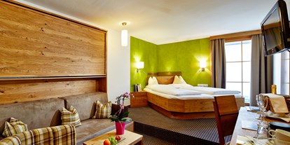Hotels am See - Bachwinkl (Saalfelden am Steinernen Meer, Maria Alm am Steinernen Meer) - Komfortzimmer mit Balkon und Klimaanlage - Hotel Fischerwirt
