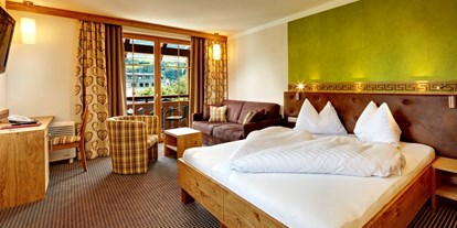 Hotels am See - Bachwinkl (Saalfelden am Steinernen Meer, Maria Alm am Steinernen Meer) - Superior Zimmer mit Balkon und Klimaanlage - Hotel Fischerwirt