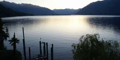 Hotels am See - Abendmenü: à la carte - Lago Maggiore - romantische Aussicht - Art Hotel Posta al lago