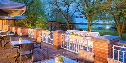 Hotels am See - Garten mit Seezugang - Zepelin - Terrasse - Kurhaus am Inselsee