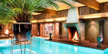 Hotels am See - Sauna - Deutschland - Innenpool mit Großkamin - Wellnesshotel Seeschlößchen - Privat-SPA & Naturresort