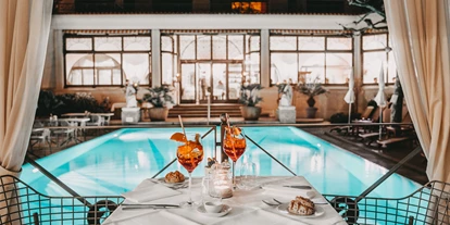 Hotels am See - Bettgrößen: Twin Bett - Tessin - Abendessen am Pool - Sunstar Hotel Brissago - Sunstar Hotel Brissago