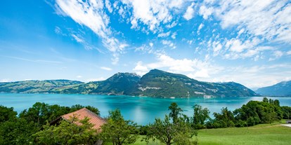 Hotels am See - Umgebungsschwerpunkt: See - Gsteigwiler - Panoramasicht auf dem Thunersee - Hotel Sunnehüsi