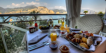 Hotels am See - Spielplatz am See - Ein klassisches Beispiel für unser königliches Frühstück.  - Belfiore Park Hotel