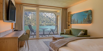 Hotels am See - Art des Seezugangs: öffentlicher Seezugang - Tannheimertal - haldensee**** - Naturerlebnis und Wellnesshotel