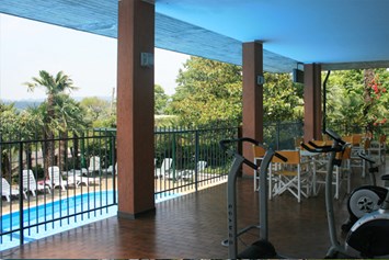 Urlaub am See: kleiner Fitnessraum für Hotelkunden  - Hotel Residence Miralago