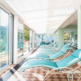 Urlaub am See: Gemütliche Liegen im SPA-Bereich - Seeglück Hotel Forelle**** S Millstatt