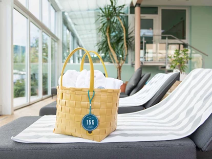Hotels am See - Millstatt - Wellnesstasche mit Bademantel - Seeglück Hotel Forelle**** S Millstatt