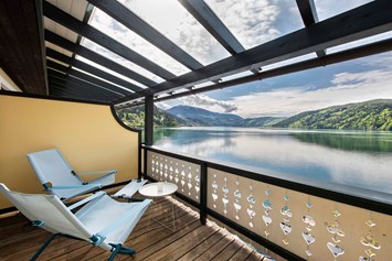 Urlaub am See: Ausblick auf den Millstätter See - Seeglück Hotel Forelle**** S Millstatt