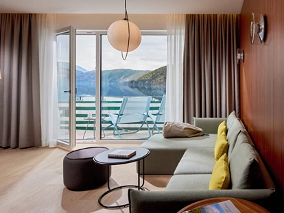 Hotels am See - Millstatt - Wohnbereich der Suite Königsforelle - Seeglück Hotel Forelle**** S Millstatt