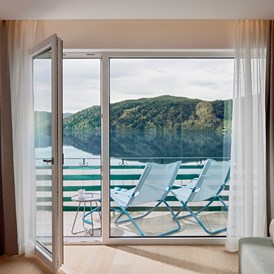 Urlaub am See: Blick auf den Millstätter See - Seeglück Hotel Forelle**** S Millstatt