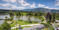 Hotels am See - barrierefrei - Pergola und private Liegewiese am Ritzensee - Ritzenhof - Hotel und Spa am See