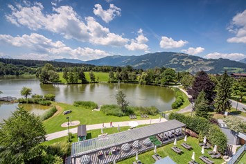 Urlaub am See: Pergola und private Liegewiese am Ritzensee - Ritzenhof - Hotel und Spa am See