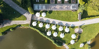 Hotels am See - FKK-Strand - Die Liegewiese im Spa am See aus der Vogelperspektive - Ritzenhof - Hotel und Spa am See
