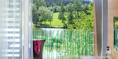 Hotels am See - FKK-Strand - Ausblick aus dem Doppelzimmer Seeblick - Ritzenhof - Hotel und Spa am See
